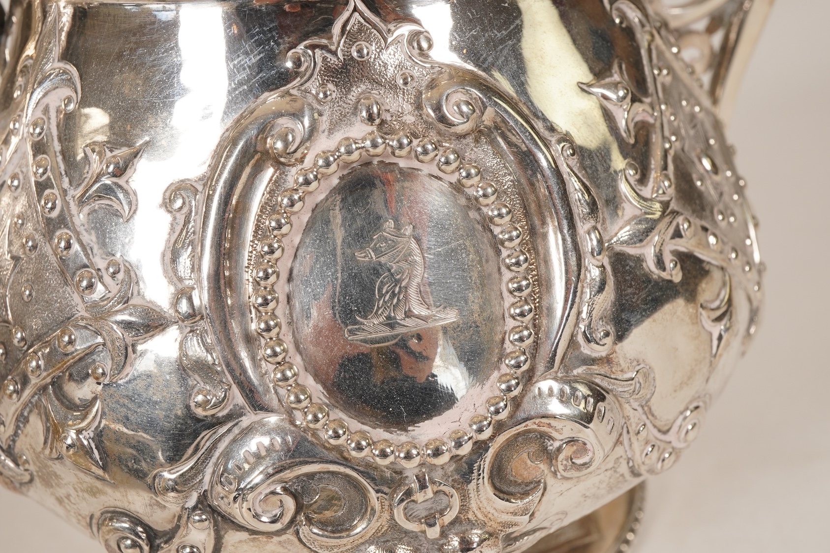 A Victorian ornate silver four piece tea and coffee service, by Thomas Smily